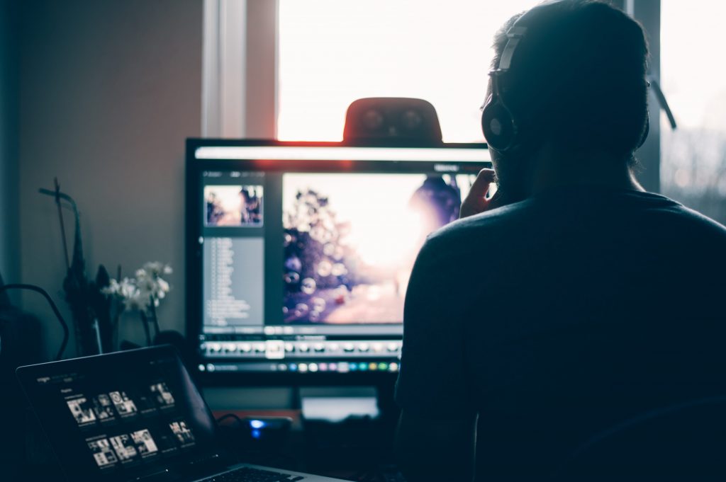 Man editing on computer