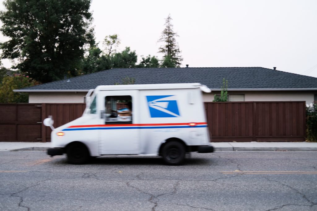 USPS Truck Driving By